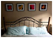 framed-pictures-and-bed-thm.jpg