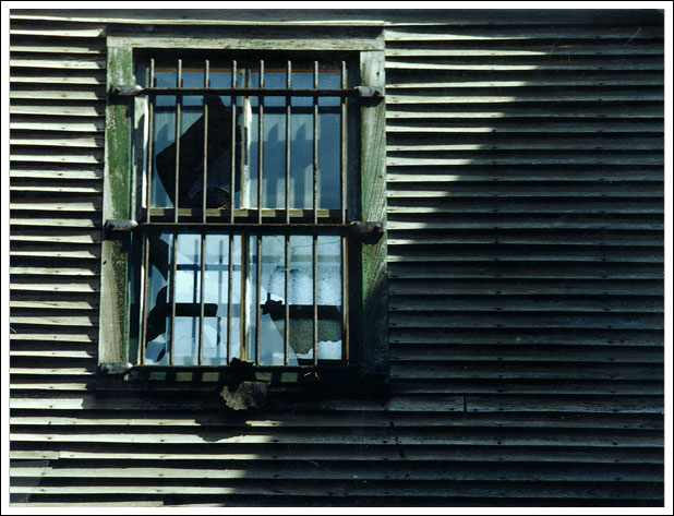 barred-broken-window.jpg